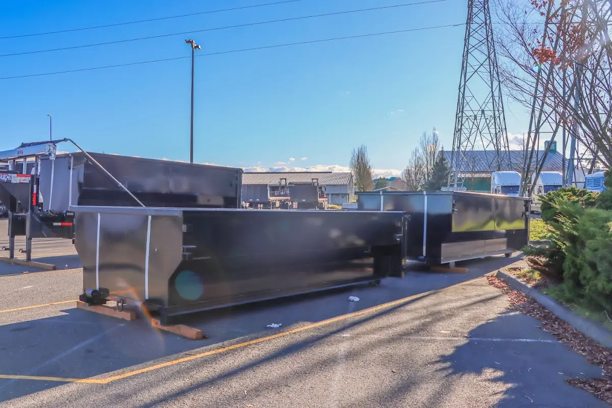 Roll-off dumpster ready for waste disposal at job site for Concrete Dumpster Rental in Timberwood Park
